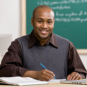 teacher_at_desk